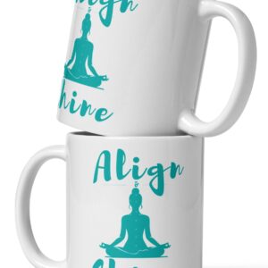 Two white coffee cups for yoga lovers stacked on top of each other with a teal design on both sides that says align and shine.