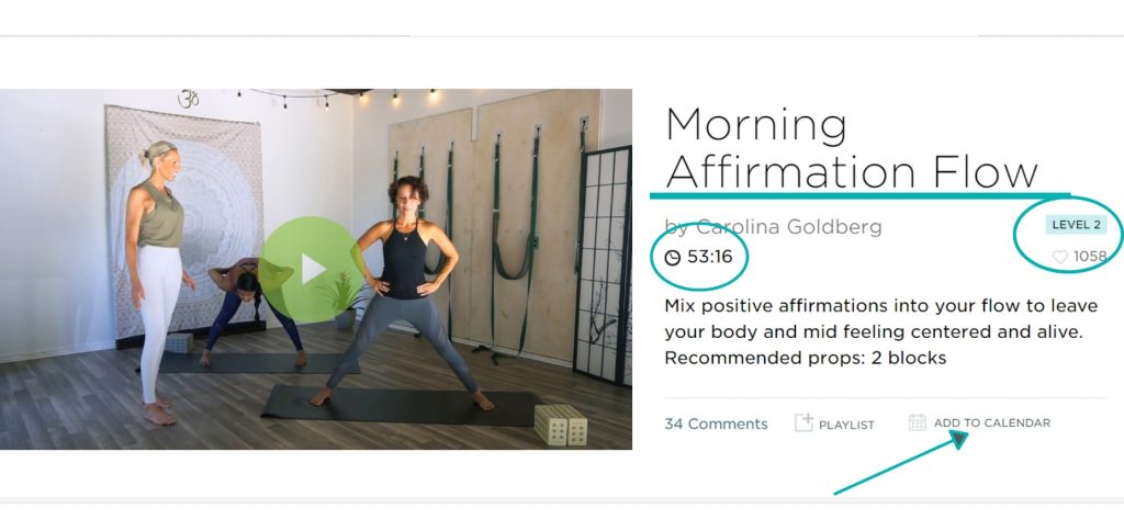 Woman teaching yoga to a student and filming online yoga class for MyYogaWorks.