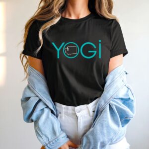 Female yogi with long hair wearing a black yoga t-shirt with a Washington State outline graphic and the word yogi.