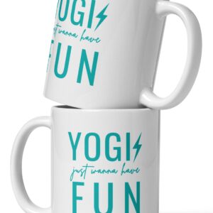 Two white coffee cups for yoga lovers stacked on top of each other with a teal design on both sides that says sun yogis just wanna have fun.